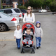 Nichols unknowingly endures more than a dozen speculations about her qualifications as a mother during her walk from her car to the entrance of a local bank branch.